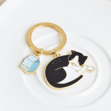 llavero gato leche